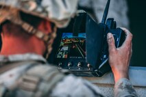 U.S. Marine Corps Lance Cpl. Nicholas Nguyen with 1st Battalion, 7th Marine Regiment, 1st Marine Division, flies a small unmanned aerial system Integrated Training Exercise (ITX) 2-19 at Range 220 on Marine Corps Air Ground Combat Center, Twentynine Palms, Calif., Feb. 9, 2019. The purpose of ITX is to create a challenging, realistic training environment that produces combat-ready forces capable of operating as an integrated Marine Air Ground Task Force. (U.S. Marine Corps photo by Lance Cpl. Corey Mathews)