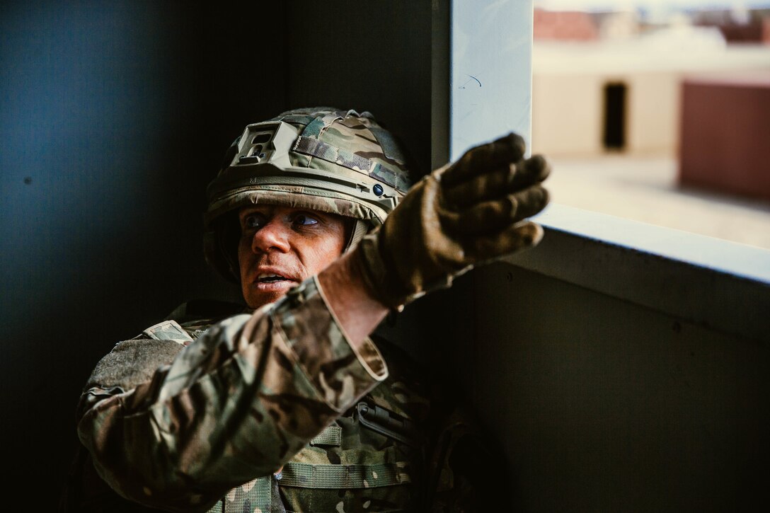 A U.K. Royal Marine L/Cpl Daryl Shaw,821 Naval Air Squadron, 33 Engineer Regiment attached to 45 Commando, participates in force on force training during Integrated Training Exercise (ITX) 2-19 at Range 220, Marine Corps Air Ground Combat Center, Twentynine Palms, Calif. Feb. 9, 2019. ITX creates a challenging, realistic training environment that produces combat-ready forces capable of operating as an integrated Marine Air Ground Task Force. (U.S. Marine Corps photo by Cpl. Jennessa Davey)