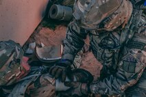 U.K. Royal Marine with 45 Commando, treat a simulated casualty during Integrated Training Exercise (ITX) 2-19 at Range 220, Marine Corps Air Ground Combat Center, Twentynine Palms, Calif. Feb. 9, 2019. ITX creates a challenging, realistic training environment that produces combat-ready forces capable of operating as an integrated Marine Air Ground Task Force. (U.S. Marine Corps photo by Cpl. Jennessa Davey)