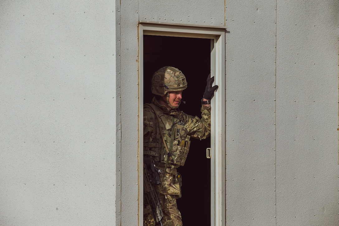 A U.K. Royal Marine with 45 Commando participates in training during Integrated Training Exercise (ITX) 2-19 at Range 220, Marine Corps Air Ground Combat Center, Twentynine Palms, Calif. Feb. 9, 2019. ITX creates a challenging, realistic training environment that produces combat-ready forces capable of operating as an integrated Marine Air Ground Task Force. (U.S. Marine Corps photo by Cpl. Conner Downey)