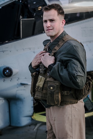 A U.S. Marine with Marine Aircraft Group 13, 3rd Marine Aircraft Wing (3rd MAW) poses for a portrait on the flightline at Marine Corp Air Ground Combat Center, Twentynine Palms, Calif., Feb 15, 2019. Exercises such as this provide realistic training necessary for 3rd MAW as the Marine Corps’ Largest aircraft wing and ensures the unit remains ready. (U.S. Marine Corps photo by Lance Cpl. Colton Brownlee)