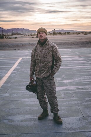 A U.S. Marine with Marine Aircraft Group 13, 3rd Marine Aircraft Wing (3rd MAW) poses for a portrait on the flightline at Marine Corp Air Ground Combat Center, Twentynine Palms, Calif., Feb 15, 2019. Exercises such as this provide realistic training necessary for 3rd MAW as the Marine Corps’ Largest aircraft wing and ensures the unit remains ready. (U.S. Marine Corps photo by Lance Cpl. Colton Brownlee)