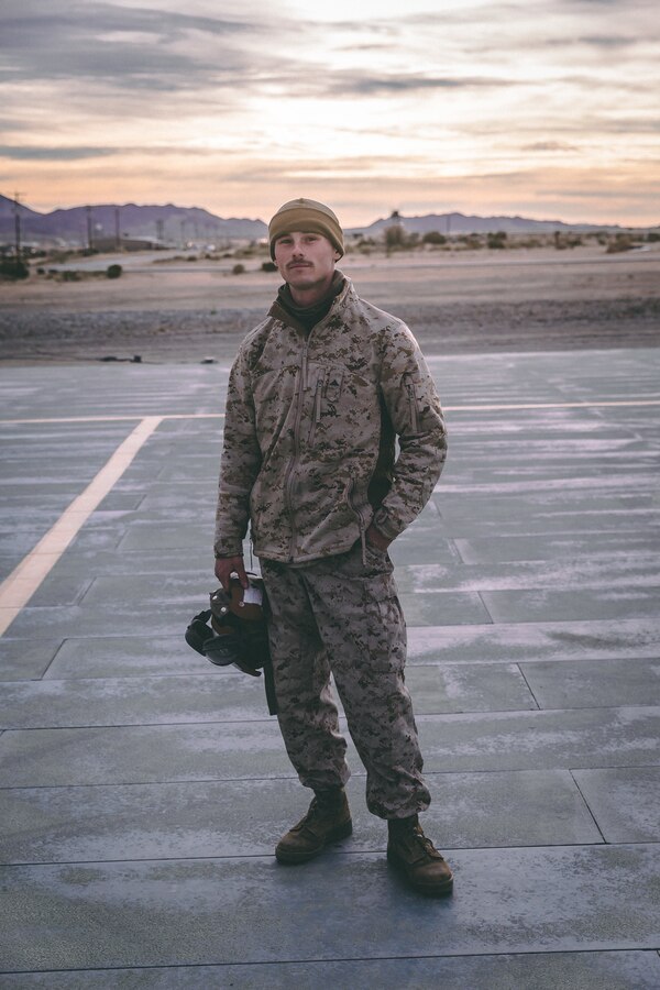 A U.S. Marine with Marine Aircraft Group 13, 3rd Marine Aircraft Wing (3rd MAW) poses for a portrait on the flightline at Marine Corp Air Ground Combat Center, Twentynine Palms, Calif., Feb 15, 2019. Exercises such as this provide realistic training necessary for 3rd MAW as the Marine Corps’ Largest aircraft wing and ensures the unit remains ready. (U.S. Marine Corps photo by Lance Cpl. Colton Brownlee)