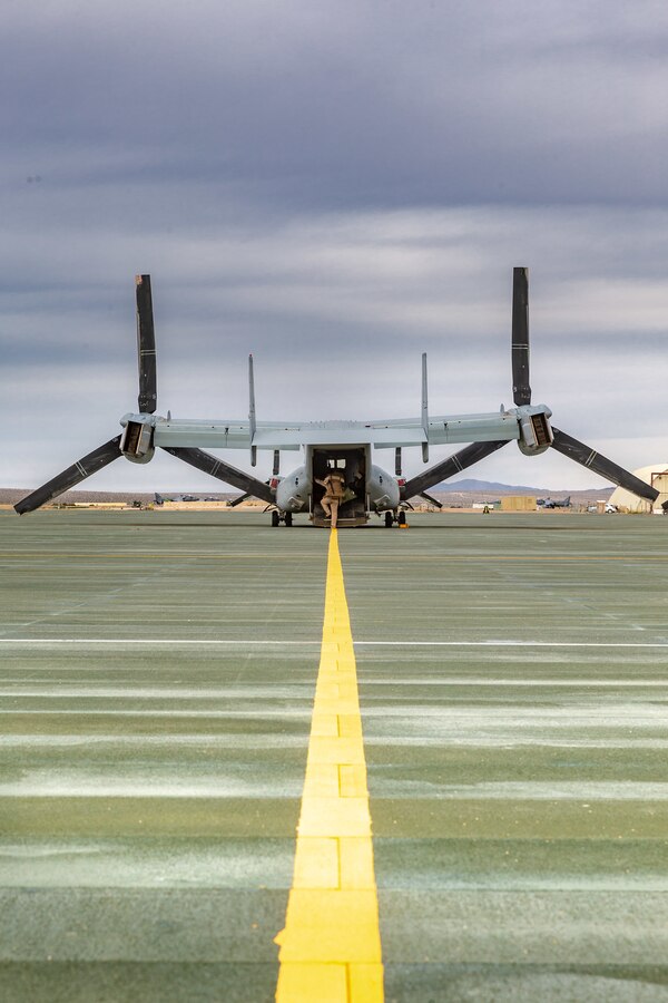 A U.S. Marine with Marine Aircraft Group 13, 3rd Marine Aircraft Wing (3rd MAW) boards an MV-22 Osprey at the flightline on Marine Corp Air Ground Combat Center, Twentynine Palms, Calif., Feb 15, 2019. Exercises such as this provide realistic training necessary for 3rd MAW as the Marine Corps’ Largest aircraft wing and ensures the unit remains ready. (U.S. Marine Corps photo by Lance Cpl. Colton Brownlee)