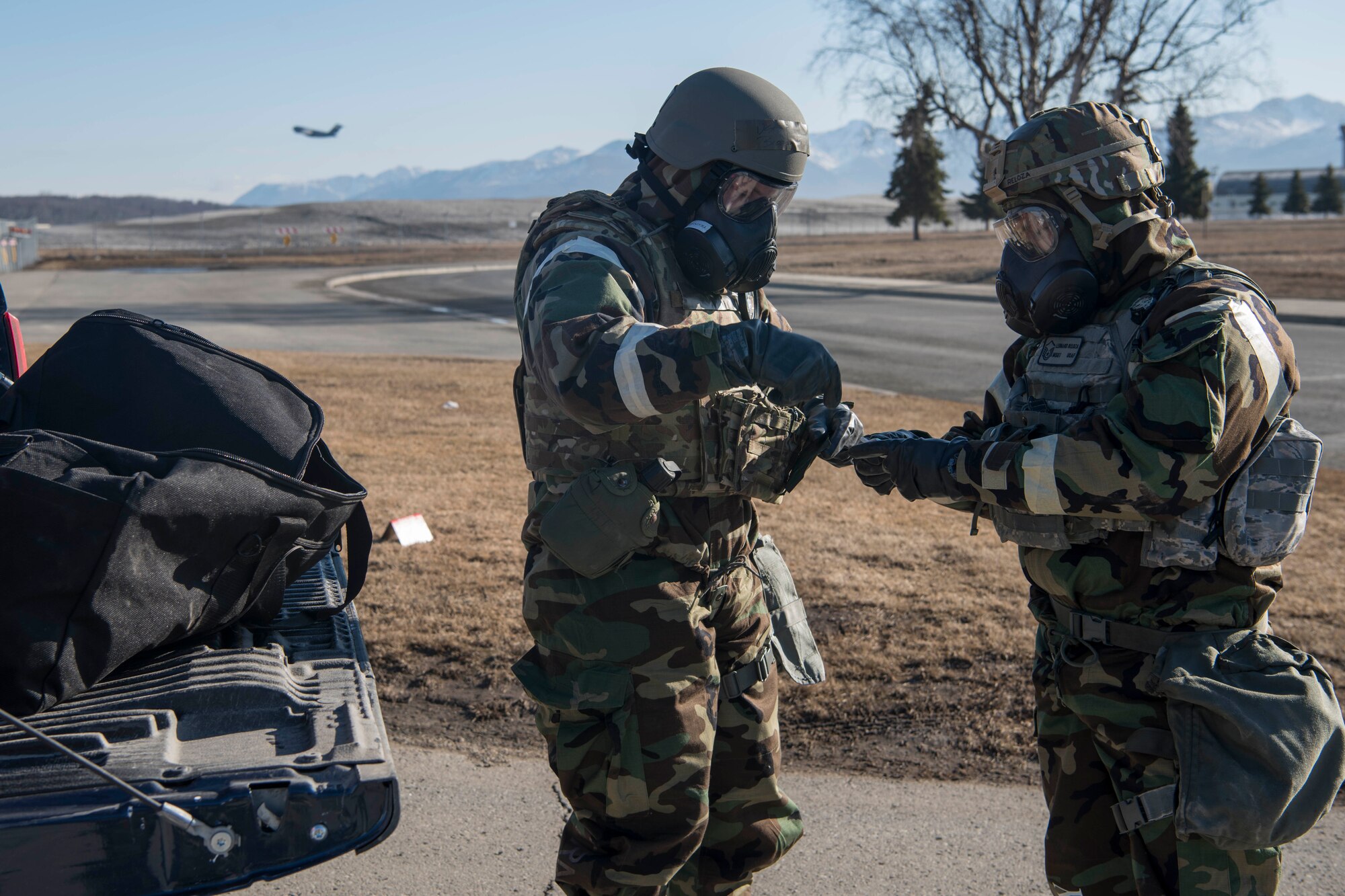 U.S. Air Force Master Sgt. Leonard Reloza, right, a 176th Civil Engineer Squadron emergency management technician and Staff Sgt. Garrett Broadwater, a 773d CES emergency management technician, analyze a chemical hazard detection green ampoule tester during exercise Polar Force 19-4 at Joint Base Elmendorf-Richardson, Alaska, April 3, 2019. The tool responds to chemical vapors and toxic substances. Polar Force is a two-week exercise designed to test JBER’s mission readiness, and develops the skills service members require to face adverse situations.