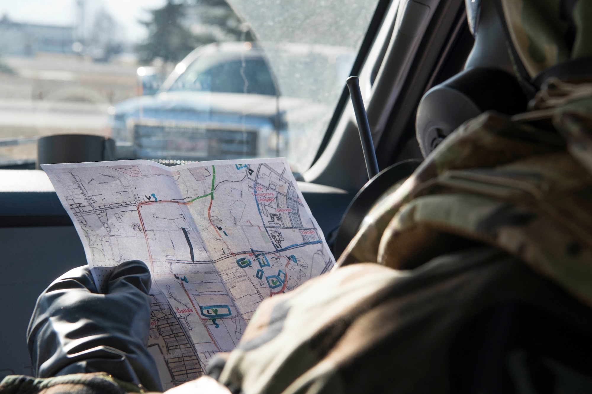 U.S. Air Force Staff Sgt. Garrett Broadwater, a 773d CES emergency management technician, looks at a perimeter map during exercise Polar Force 19-4 at Joint Base Elmendorf-Richardson, Alaska, April 3, 2019. The reconnaissance team assesses contamination, casualties, and damage, then reports their findings to the Emergency Operations Center. Polar Force is a two-week exercise designed to test JBER’s mission readiness, and develops the skills service members require to face adverse situations.
