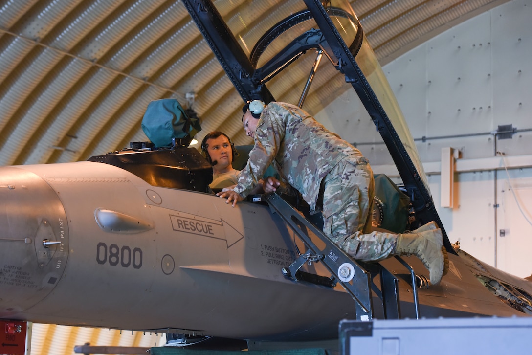 Airmen with the 31st Aircraft Maintenance Squadron, perform routine maintenance on an F-16 Fighting Falcon at Aviano Air Base, Italy, April 3, 2019. The 31 AMXS aids the 31st Fighter Wing with its combat role by maintaining aircraft and personnel in a high state of readiness.