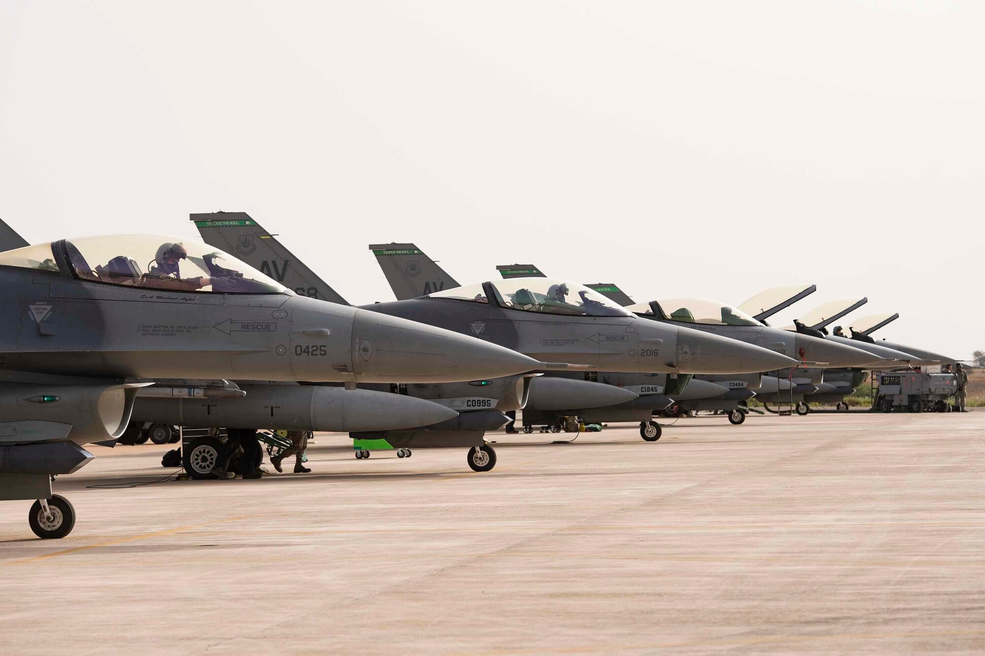 F-16C Fighting Falcons from the 555th Expeditionary Fighter Squadron rest on the flight line during exercise African Lion 2019 at Ben Guerir Air Base, Morocco.