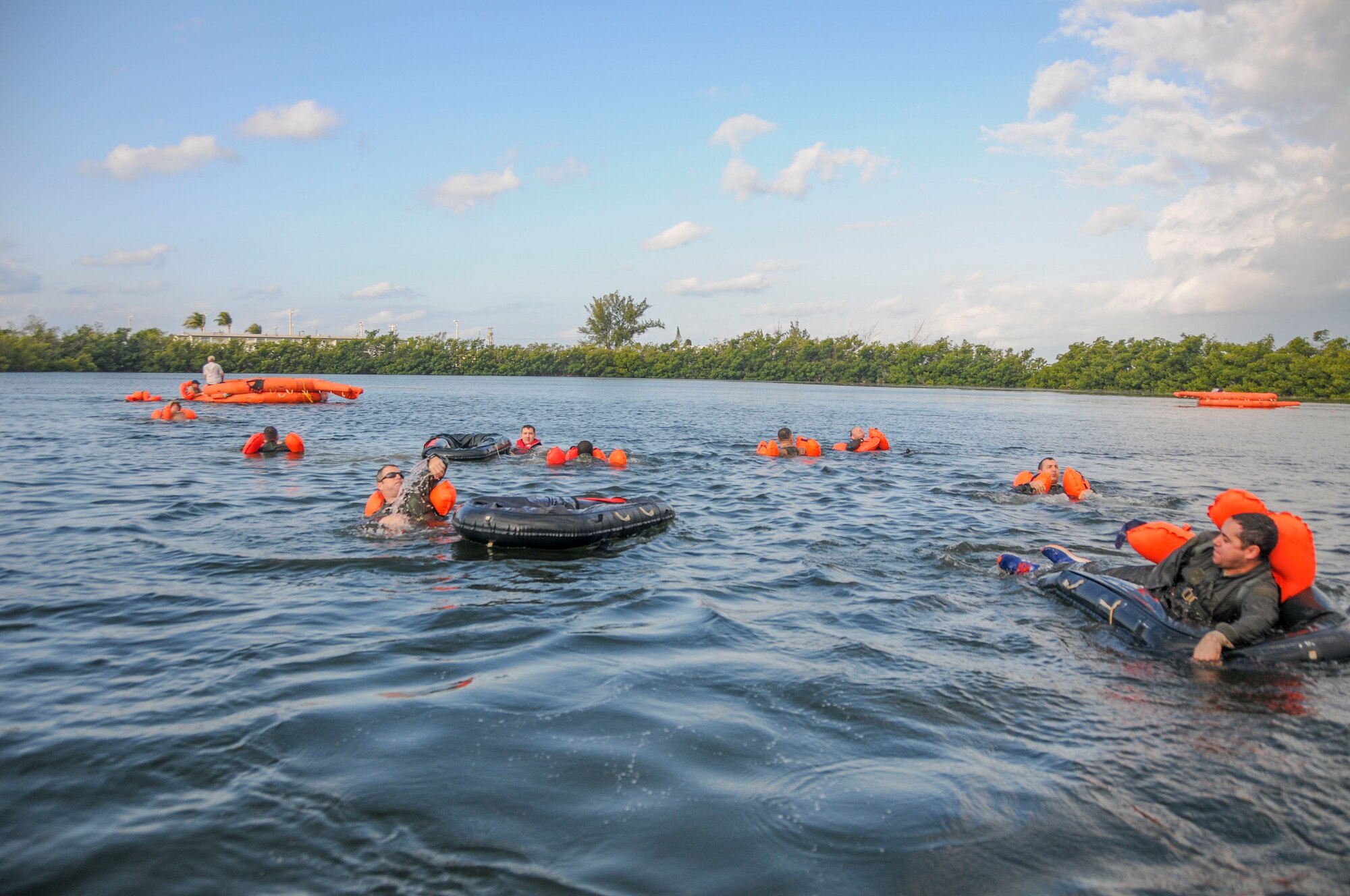 Members of the 94th Operations Group participate in Water Survival Training at Naval Air Station Key West, Florida March 27, 2019. The two-day Survival, Evasion, Resistance and Escape course prepared aircrew, aeromedical and aircraft flight equipment personnel how to deal with emergencies on water and land. (U.S. Air Force photo/Senior Airman Justin Clayvon)