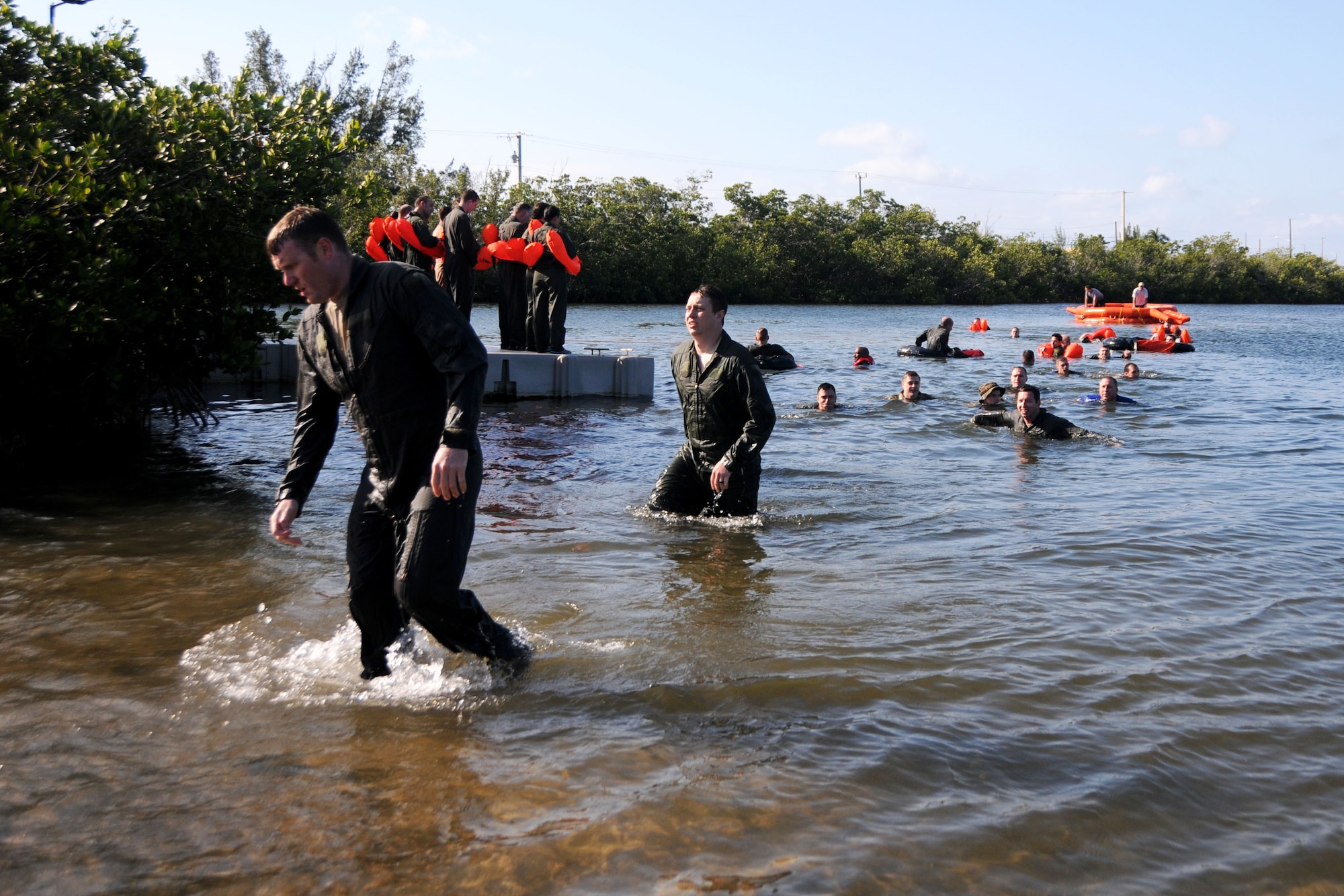 Members of the 94th Operations Group complete Water Survival Training at Naval Air Station Key West, Florida March 27, 2019. The two-day Survival, Evasion, Resistance and Escape course prepared aircrew, aeromedical and aircraft flight equipment personnel how to deal with emergencies on water and land. (U.S. Air Force photo/Senior Airman Justin Clayvon)