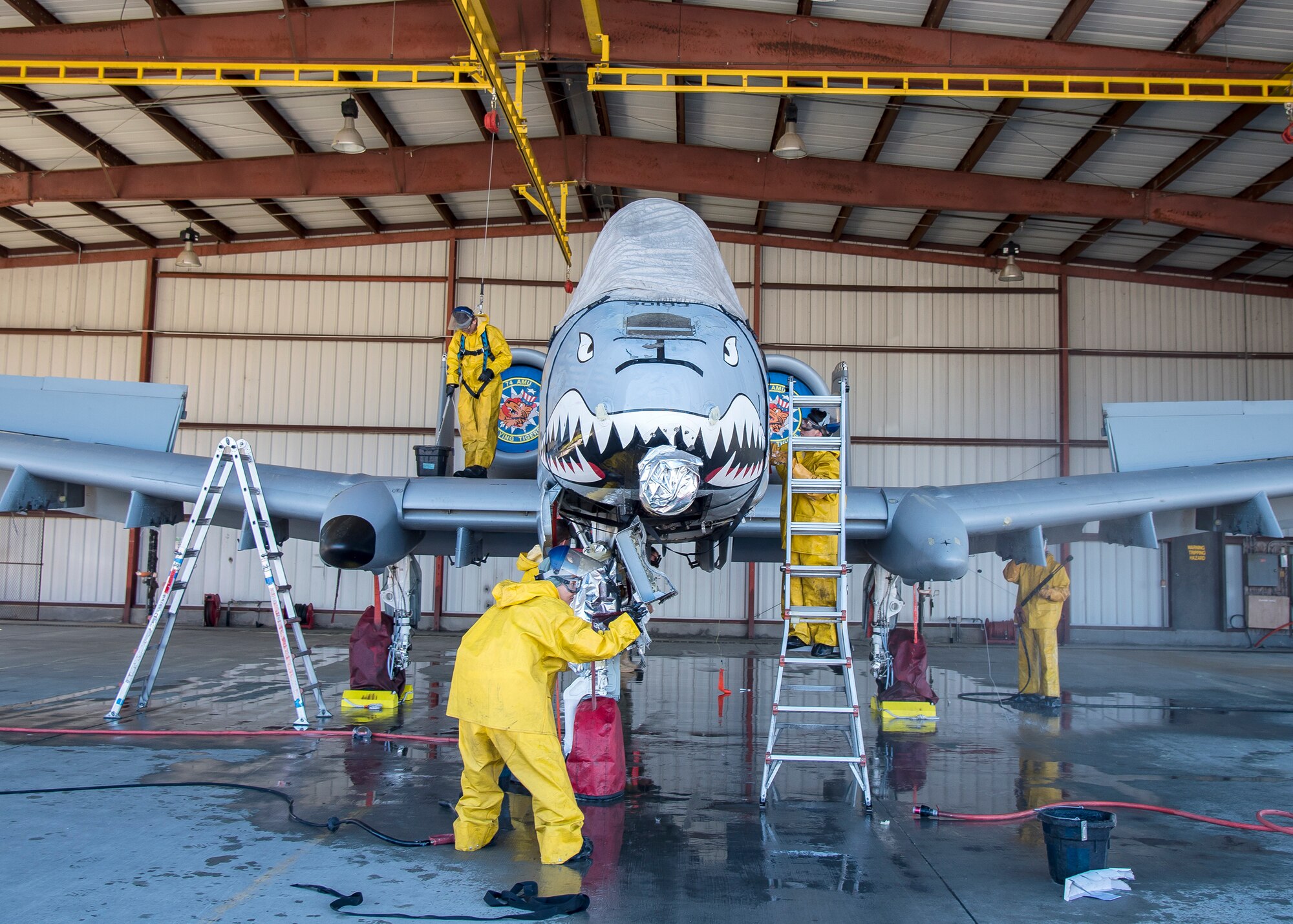 Airmen from the 23d Maintenance Group wash an A-10C Thunderbolt II, Feb. 25, 2019, at Moody Air Force Base, Ga. On top of their daily scheduled maintenance a team of six Airmen dedicated over 10 hours washing the A-10 to ensure the aircraft was free of any surface or structural deficiencies that could present a safety hazard during flight. (U.S. Air Force photo by Airman 1st Class Eugene Oliver)