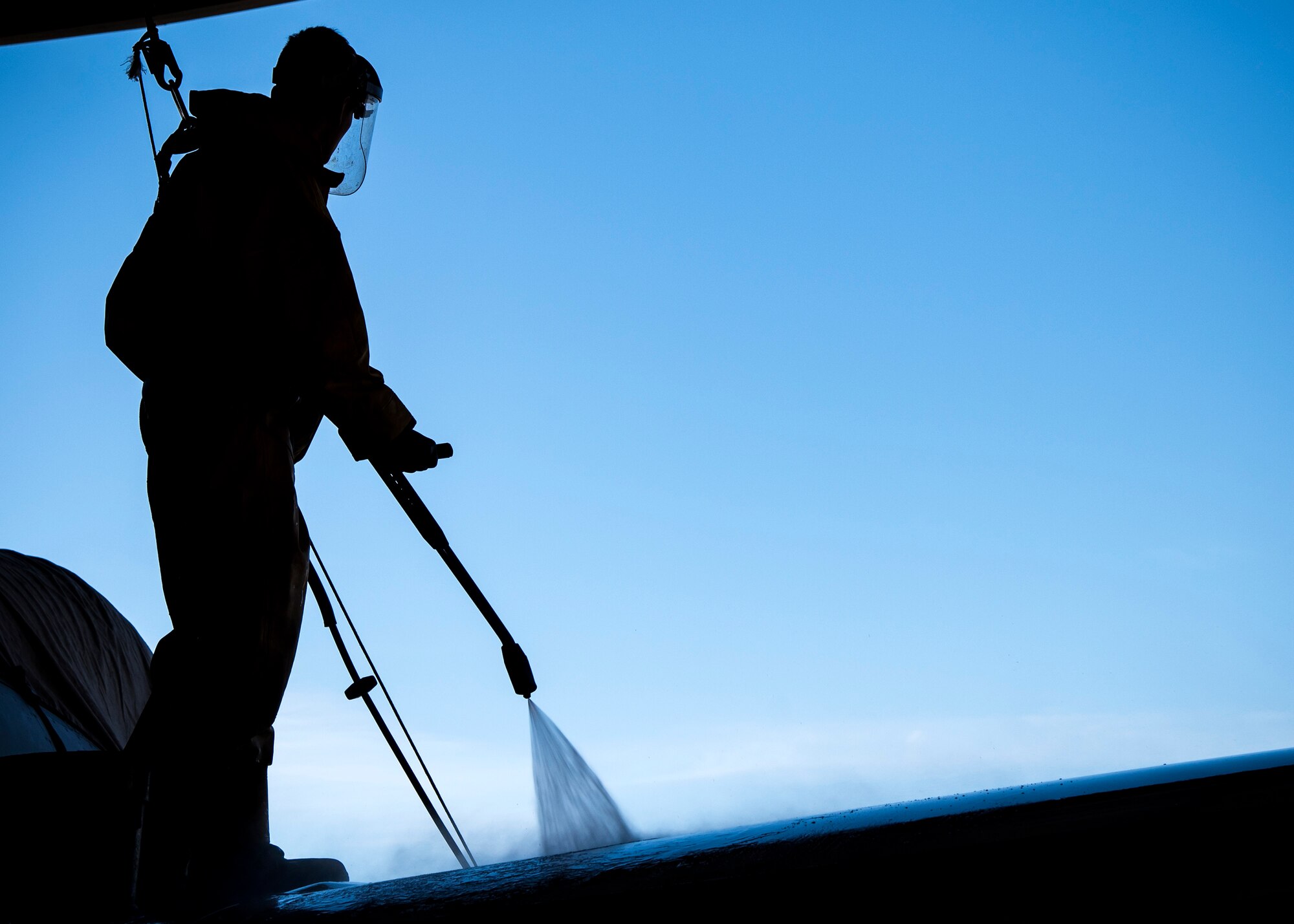 Airman 1st Class Benjamin Jones, 74th Aircraft Maintenance Unit crew chief, uses a power washer to clean the wing of an A-10C Thunderbolt II, Feb. 25, 2019, at Moody Air Force Base, Ga. On top of their daily scheduled maintenance a team of six Airmen dedicated over 10 hours washing the A-10 to ensure the aircraft was free of any surface or structural deficiencies that could present a safety hazard during flight. (U.S. Air Force photo by Airman 1st Class Eugene Oliver)