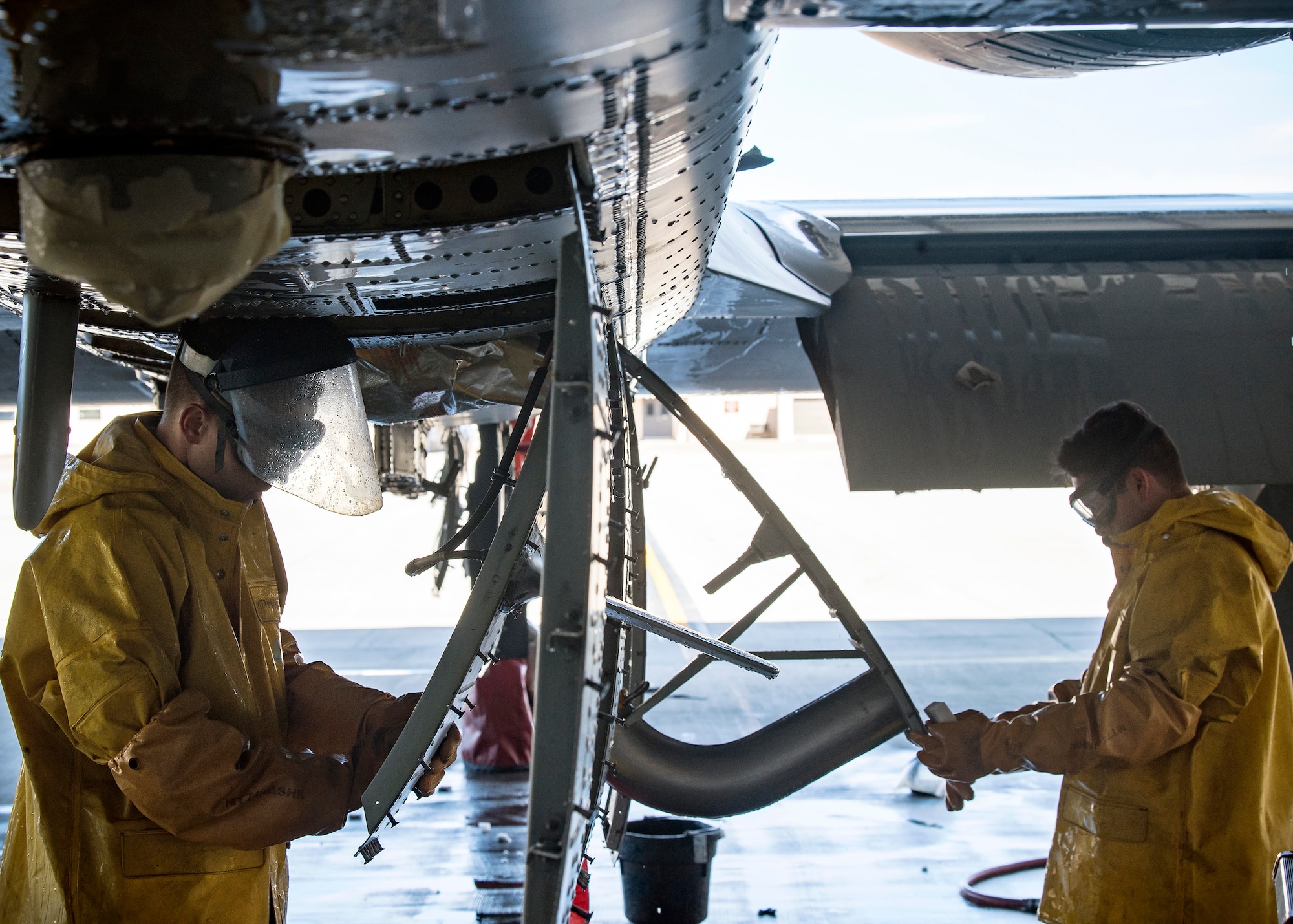 Airman 1st Class Eric Foster, left, and Airman 1st Class Hector Ramirez-Borbon, 74th Aircraft Maintenance Unit crew chiefs, clean components of an A-10C Thunderbolt II, Feb. 25, 2019, at Moody Air Force, Ga. To guarantee Moody’s fleet of 49 A-10s are in peak warfighting condition, Airmen from the 23d Maintenance Group dedicated over 10 hours washing an A-10 to ensure the aircraft is free of any surface or structural deficiencies that could present a safety hazard during flight. (U.S. Air Force photo by Airman 1st Class Eugene Oliver)