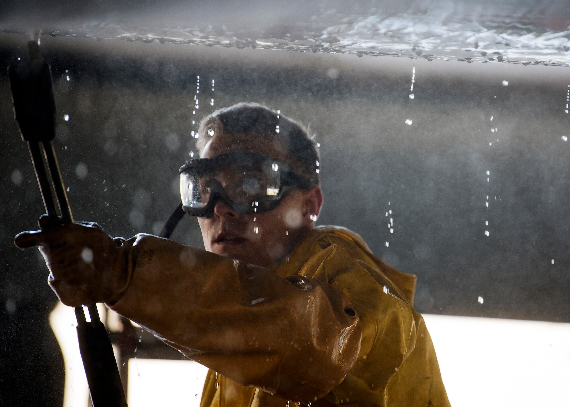 Airman 1st Class Eric Foster, 74th Aircraft Maintenance unit crew chief, uses a power washer to clean an A-10C Thunderbolt II, Feb. 25, 2019, at Moody Air force Base, Ga. On top of their daily scheduled maintenance a team of six Airmen dedicated over 10 hours washing the A-10 to ensure the aircraft was free of any surface or structural deficiencies that could present a safety hazard during flight. (U.S. Air Force photo by Airman 1st Class Eugene Oliver)
