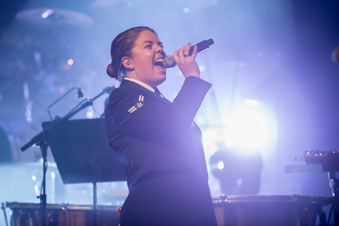 Vocalist A1C Aliyah Richling performs with members of the USAF Heartland of America Band during their annual holiday show in the Omaha NE metro area.