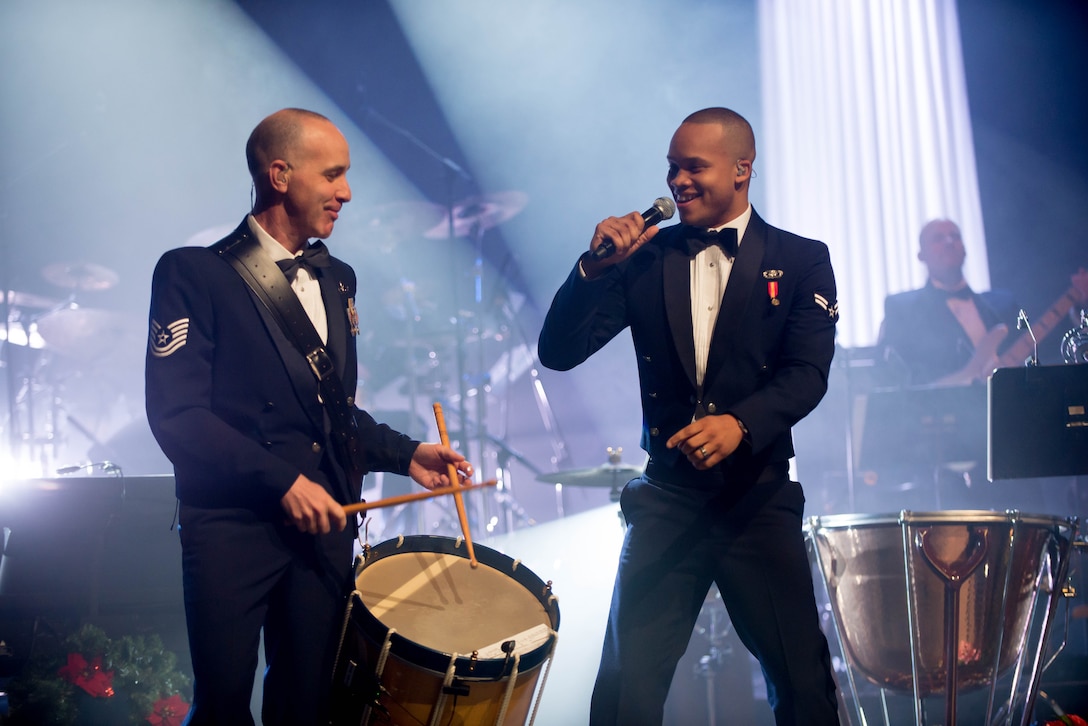 TSgt Marshall Gentry and A1C Mario Foreman-Powell, members of the USAF Heartland of America Band perform during their annual holiday performances in the Omaha metro  area.
