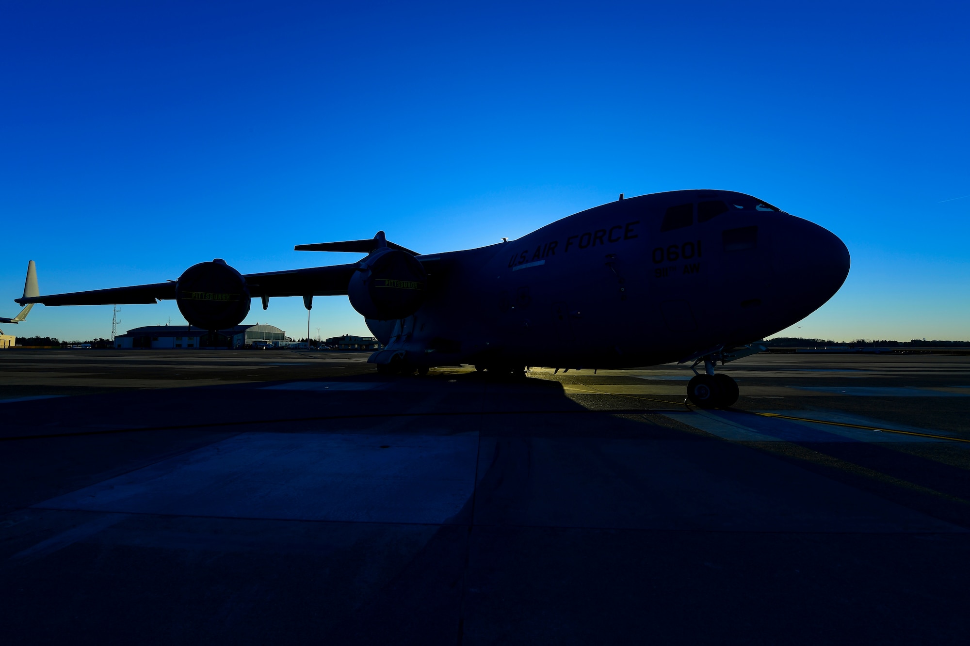 A C-17 Globemaster III assigned to the 911th Airlift Wing sits on the flightline at the Pittsburgh International Airport Air Reserve Station, Pennsylvania, March 26, 2019. The C-17 is capable of rapid strategic delivery of troops and all types of cargo to main operating bases or directly to forward bases in the deployment area.