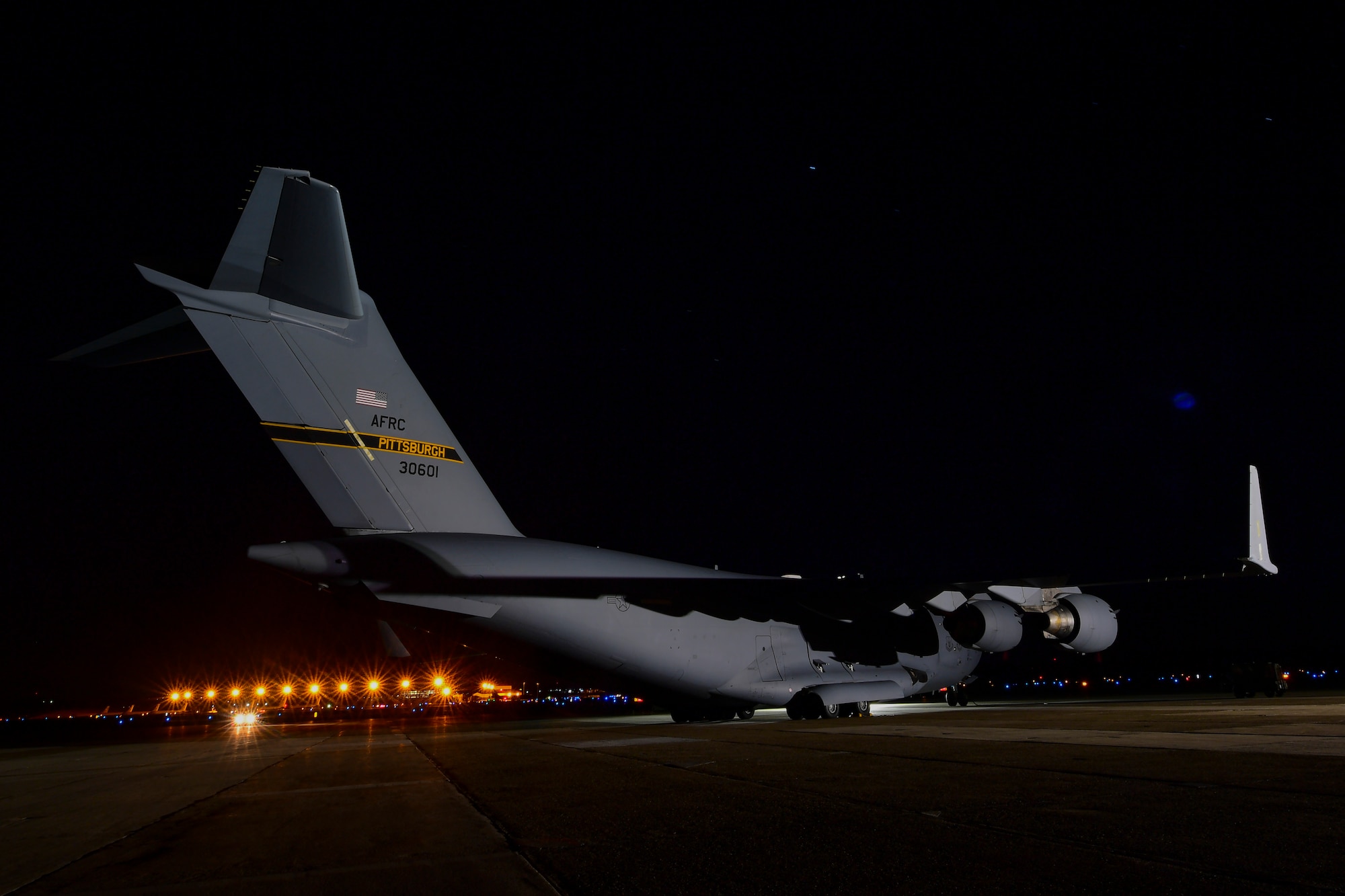 A C-17 Globemaster III assigned to the 911th Airlift Wing sits on the flightline at the Pittsburgh International Airport Air Reserve Station, Pennsylvania, March 27, 2019. The C-17 is capable of rapid strategic delivery of troops and all types of cargo to main operating bases or directly to forward bases in the deployment area.