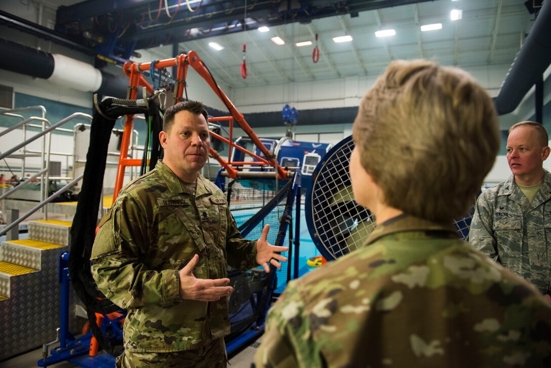 U.S. Air Force Lt. Col. Mark Scepansky, 336th Training Group deputy commander, briefs Gen. Maryanne Miller, Air Mobility Command commander, about the Survival, Evasion, Resistance and Escape water survival course at Fairchild Air Force Base, Washington, March 27, 2019. Miller’s visit offered additional exposure to the variety of missions and challenges Fairchild Airmen from the 92nd Maintenance Group, 92nd Operations Group and SERE face every day to successfully complete the mission. (U.S. Air Force photo by Airman 1st Class Lawrence Sena)