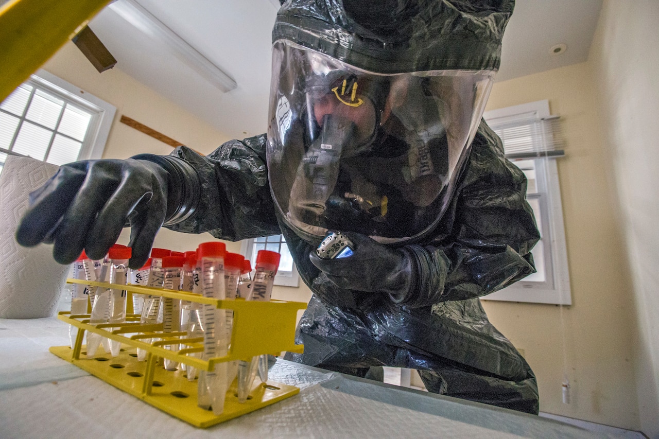 Woman holds test tube