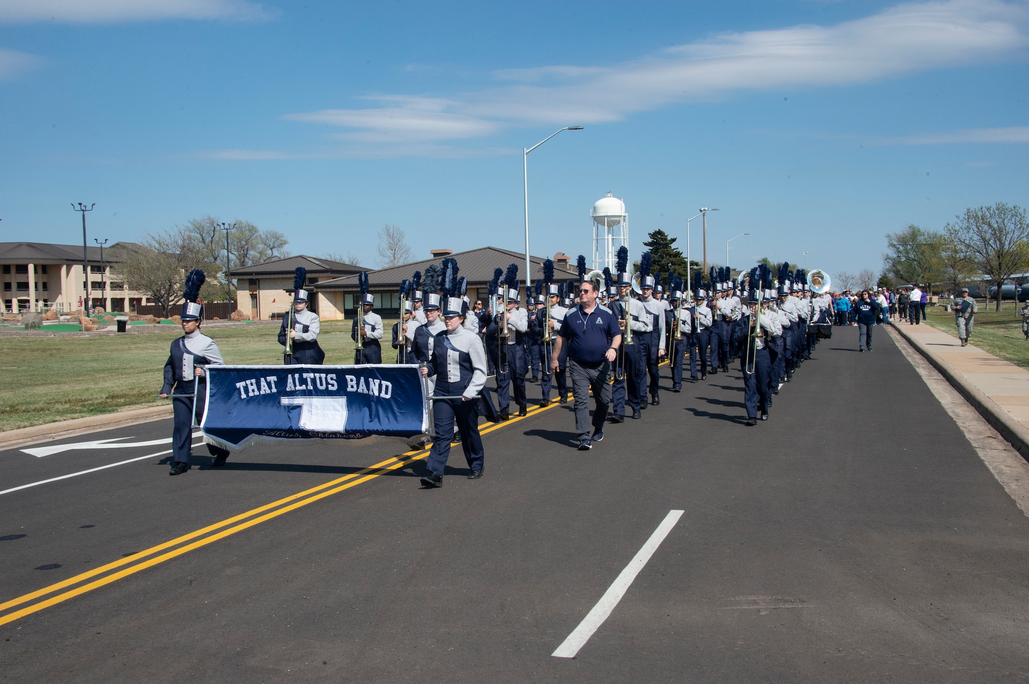 Members of the Altus High School “That Altus Band” march on the road, April 1, 2019, at Altus Air Force Base, Okla. The band helped celebrate the start of the Month of the Military Child. (U.S. Air Force photo by Senior Airman Cody Dowell)