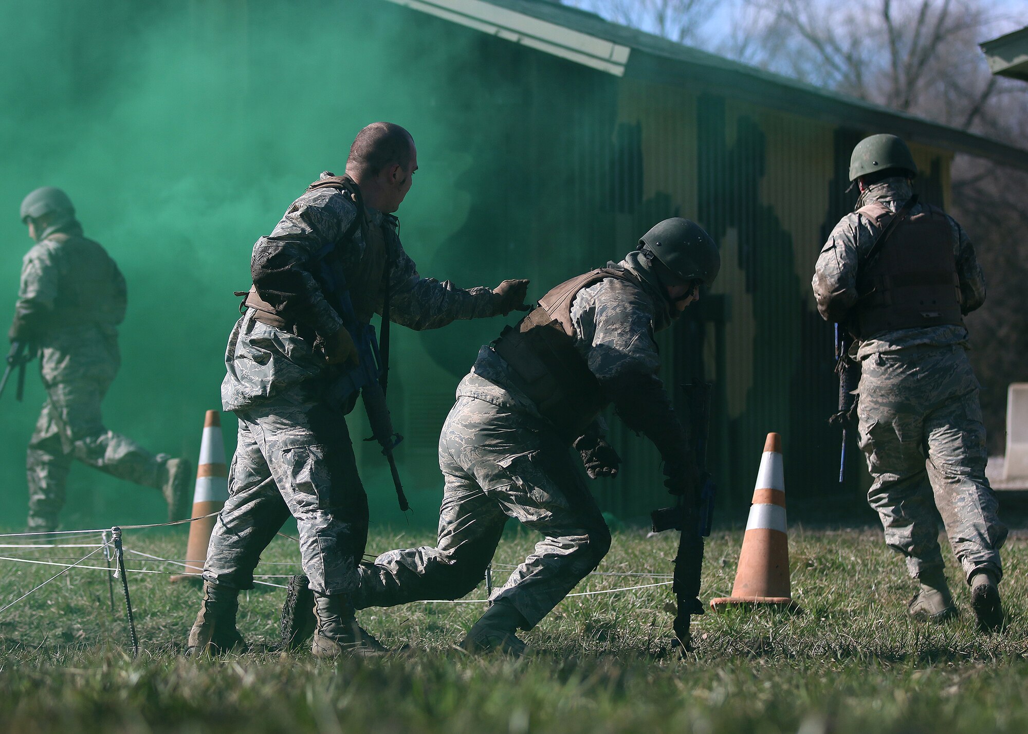 Members of the 445th Security Forces Squadron participate in the unit’s annual winter challenge March 2, 2018. The Reserve Citizen Airmen conducted vehicle inspections, participated in low crawl training, building clearing, shoot-move and communicate drills and other training during the event.