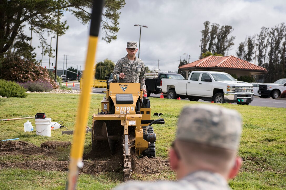 Airman 1st Class Rafael Waledziak, 30th Civil Engineering Squadron, operates machinery during base repairs April 3, 2019, on Vandenberg Air Force Base, Calif. Waledziak helps maintain Vandenberg AFB along with making repairs when needed. (U.S. Air Force photo by Airman 1st Class Hanah Abercrombie)