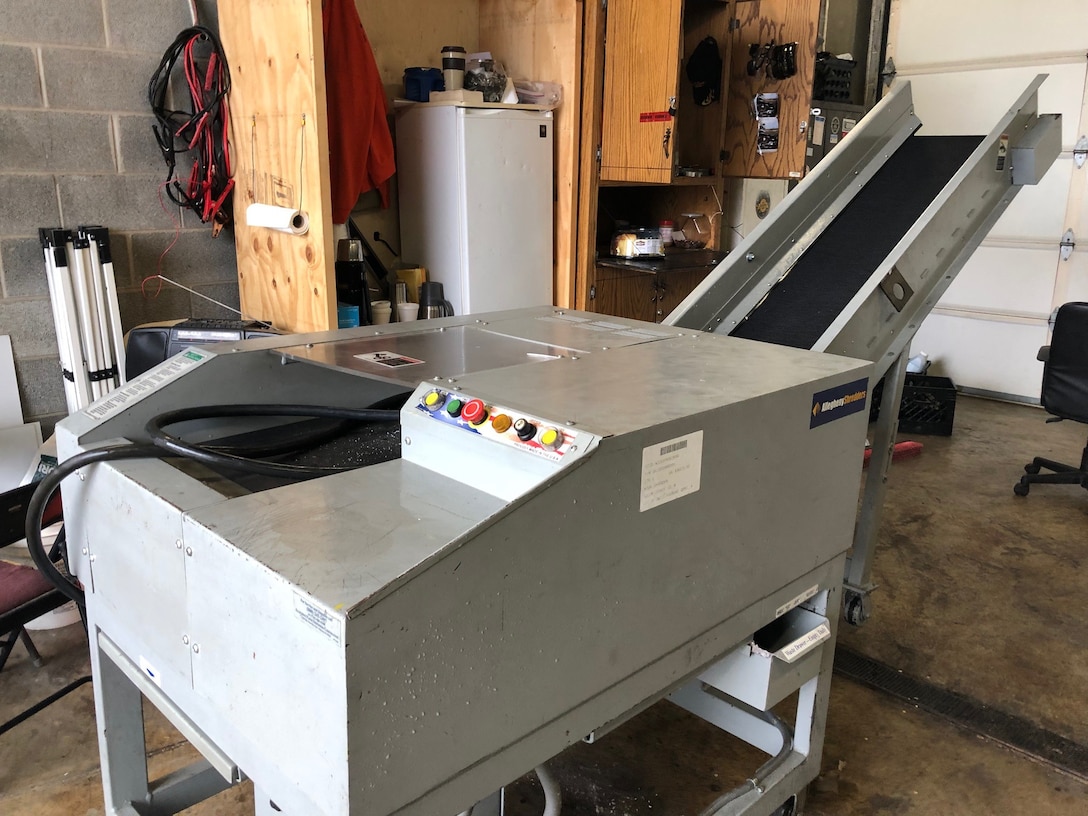 A shredder received by the Putnam County Sheriff’s Office stands by to serve at the facility for records retention destruction.