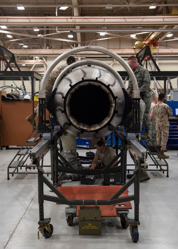 361st aerospace propulsion apprentice course students work on Aircraft engines