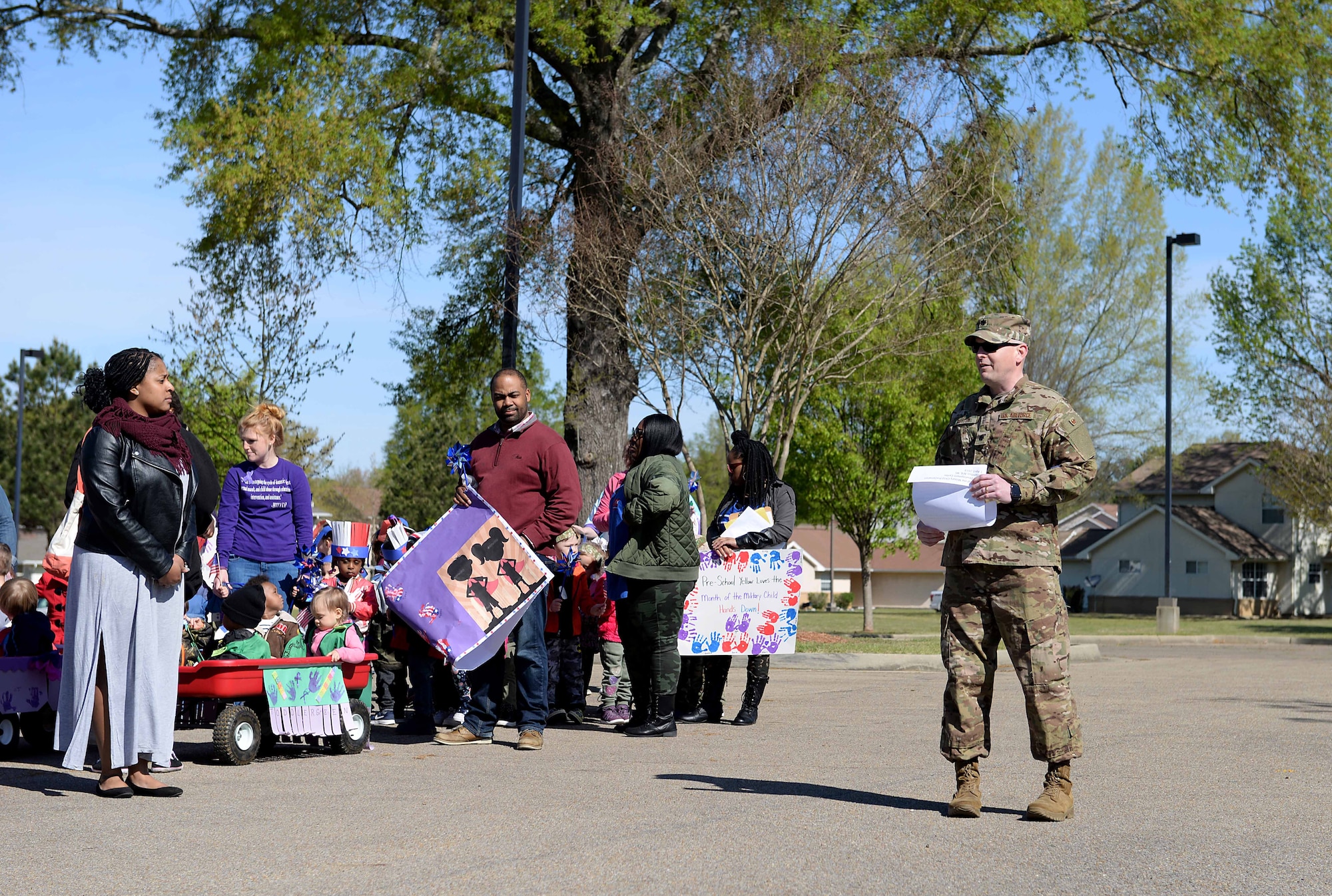 Lt. Col. Bennet Burton, 14th Mission Support Group deputy commander, announces a proclamation during the Month of the Military Child parade April 1, 2019, on Columbus Air Force Base, Miss. The parade and proclamation officially began the Month of the Military Child for Columbus AFB. (U.S. Air Force photo by Airman Hannah Bean)