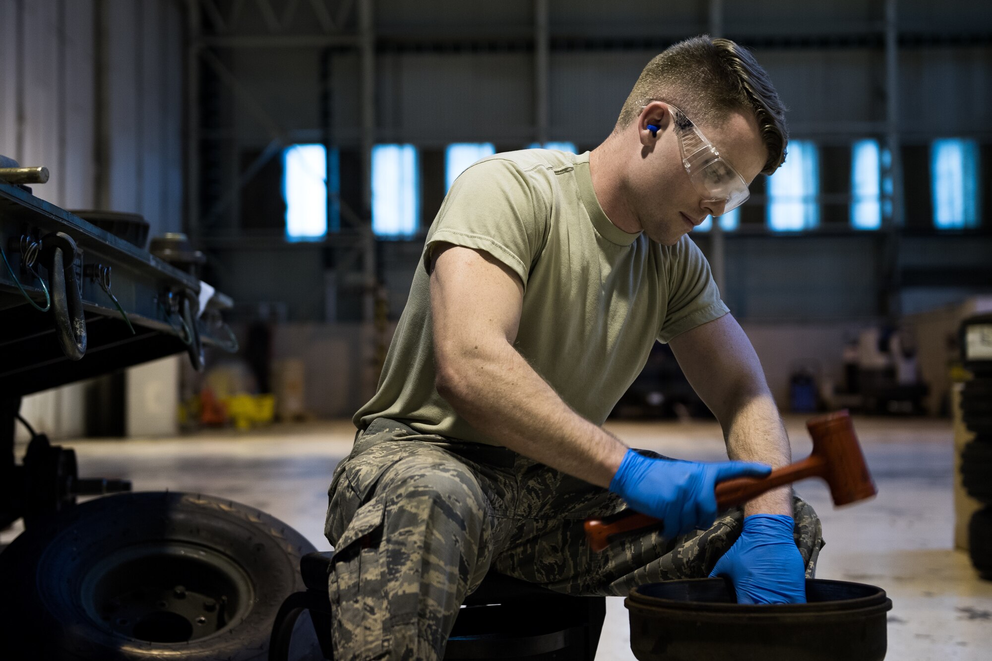 Airman 1st Class Jerrick Worley, 2nd Munitions Squadron munitions systems equipment maintenance crew chief, sets a seal into a hub at RAF Fairford, England, April 2, 2019. Since being at Fairford, 2nd MUNS Airmen like Worley have been able to work toward restoring the collection of munitions support equipment on Fairford. (U.S. Air Force photo by Airman 1st Class Tessa B. Corrick)