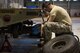 Airman 1st Class Landon Gonzales, 2nd Munitions Squadron conventional maintenance crew chief, replaces a hub on a MHU-110 munitions trailer during a U.S. Strategic Command Bomber Task Force in Europe at RAF Fairford, England, April 2, 2019. The 2nd MUNS brought Airmen for their primary duties and extra Airmen for the additional jobs such as the trailer maintenance. (U.S. Air Force photo by Airman 1st Class Tessa B. Corrick)