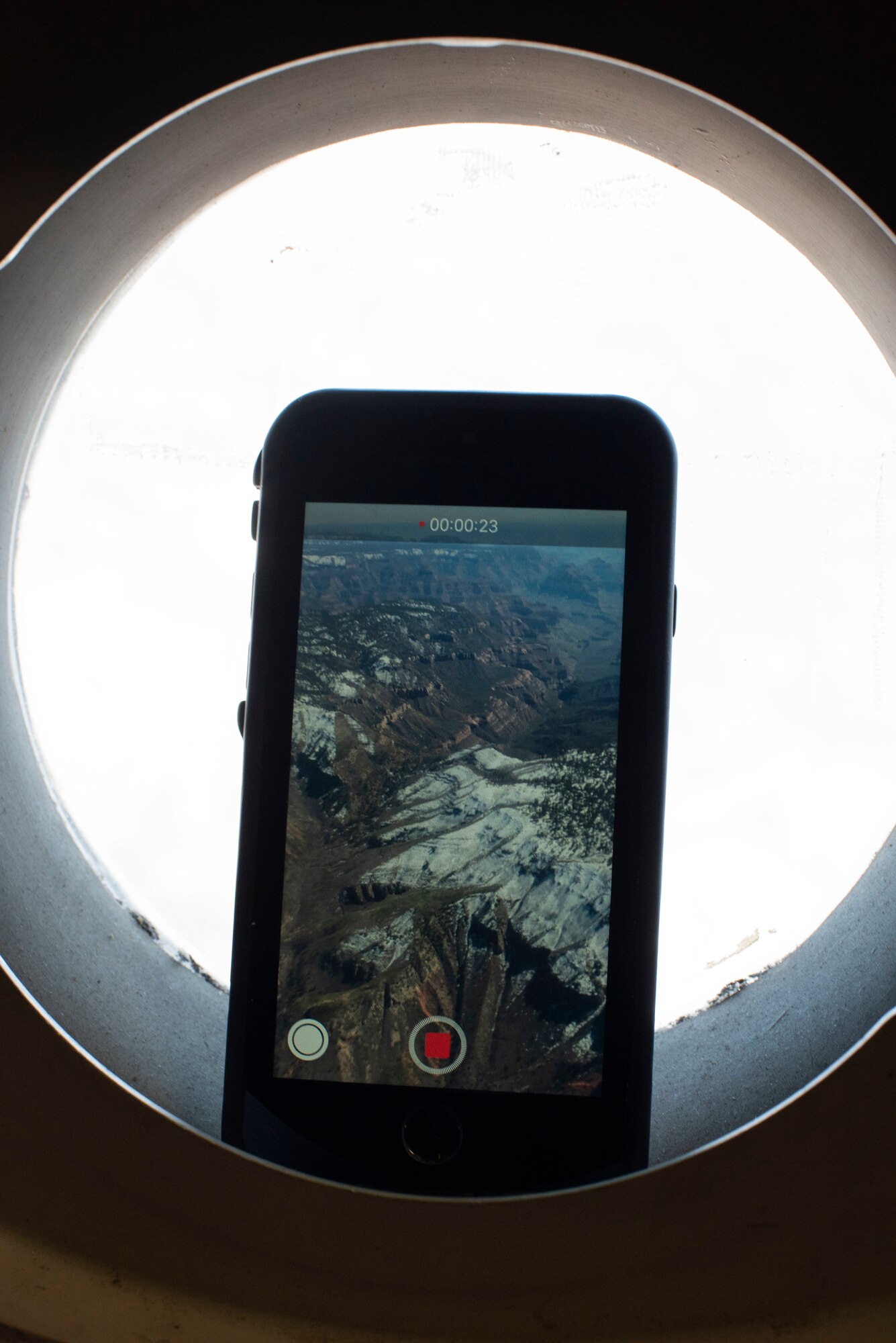 A view of the Grand Canyon is displayed from a smartphone March 25,2019.Ten Hometown Heroes were given the opportunity to fly on a C-17 Globemaster III with the 21st Airlift Squadron. This year Travis had 27 individuals nominated by their peers to be Hometown Heroes for the “Thunder Over the Bay” airshow. (U.S. Air Force photo by Airman 1st Class Jonathon Carnell)