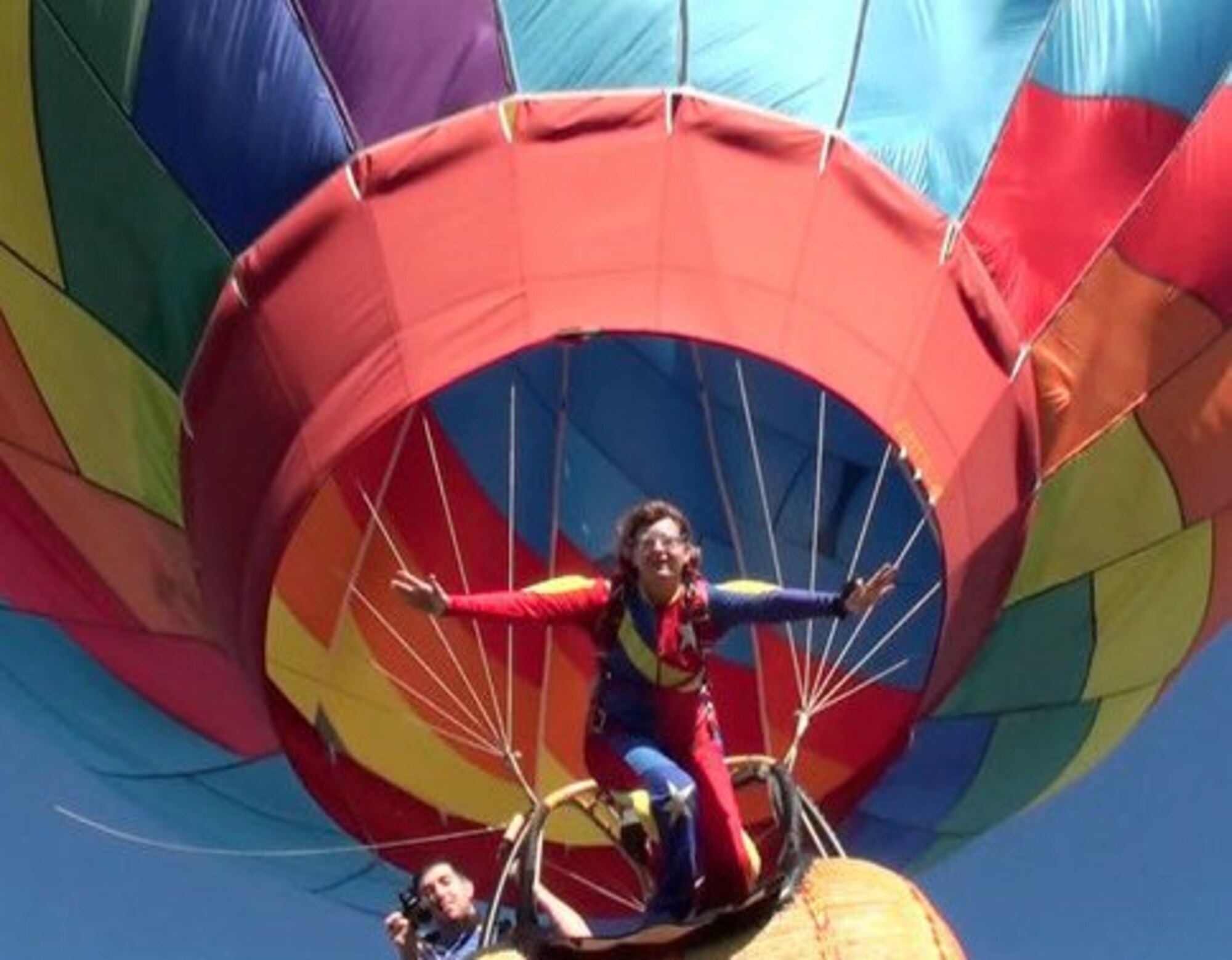 U.S. Air Force Maj. Donna Sicker, 374th Medical Group group practice manager and alternate sexual assault response coordinator out of Yokota Air Base, Japan, performs a balloon jump in Cedar Rapids, Iowa, Aug. 2008. With countless jumps throughout her skydiving career, Sickler would later discover how therapeutic jumping could be for her when it came to her reaching her new normal after being the victim of a sexual assault in April of 2011. Through family, jumping and therapy, Sickler now is able to share her story with others to help show the world that sexual assault will never be tolerated. (Courtesy photo by U.S. Air Force Maj. Donna Sickler)