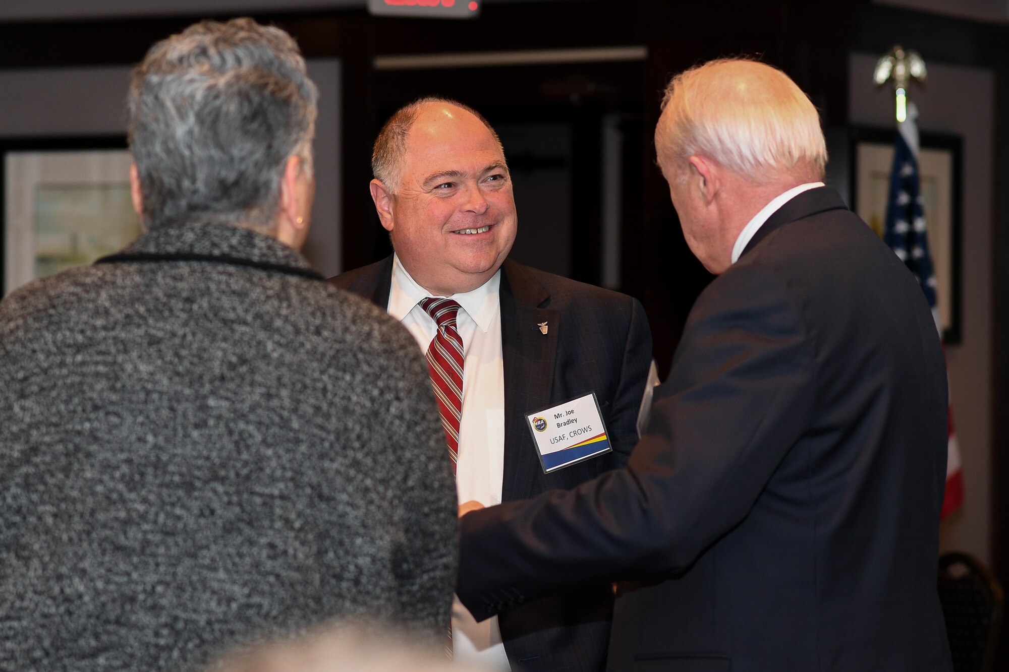 Joe Bradley, director of the Cyber Resiliency Office for Weapons Systems and associate director of engineering and technical management at Hanscom Air Force Base, Mass., meets with business partners at a Hanscom Representatives Association luncheon hosted April 3, off base. Bradley asked HRA members to keep him informed on how to work with industry to secure existing weapons systems and ‘bake security in’ to new acquisition programs. (U.S. Air Force photo by Mark Herlihy)