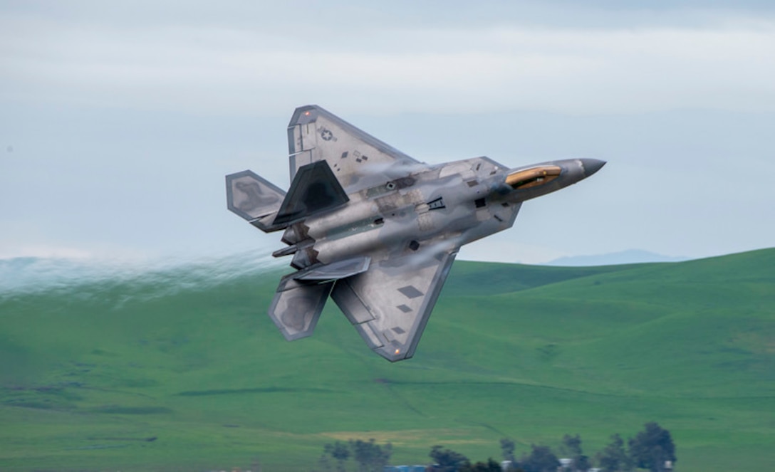 F-22 Raptors arrive at Travis Air Force Base, Calif., prior to the Thunder Over the Bay Air Show, March 25, 2019. In addition to the F-22 Raptor, the two-day event featured performances by the U.S. Air Force Thunderbirds aerial demonstration team, U.S. Army Golden Knights parachute team, flyovers and static displays. The event honored hometown heroes such as police officers, firefighters, nurses, teachers and ordinary citizens whose selfless work makep their communities safer and enhanced quality of life. (U.S. Air Force photo by Heide Couch)