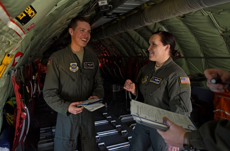 U.S. Air Force Chief Master Sgt. Andrea Inmon, 92nd Operations Group chief enlisted manager, instructs Airman 1st Class Tristen Lang, 384th Air Refueling Squadron boom operator, during cargo loading at Fairchild Air Force Base, Washington, March 21, 2019. Inmon is responsible for ensuring the 600 Airmen of the 92nd OG have the training and resources they need to perform their mission. (U.S. Air Force photo by Senior Airman Jesenia Landaverde)
