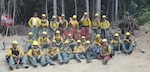 Group photo of Washington National Guard members and civilian wildfire fighters working together at the Sheep Creek Fire in August 2018.