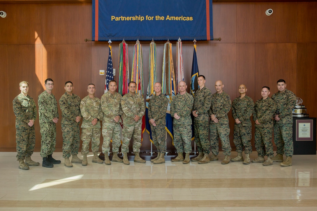 U.S. Marines and Chilean Marines pose for a group photo at U.S. Marine Corps Forces, South, March 4, 2019.