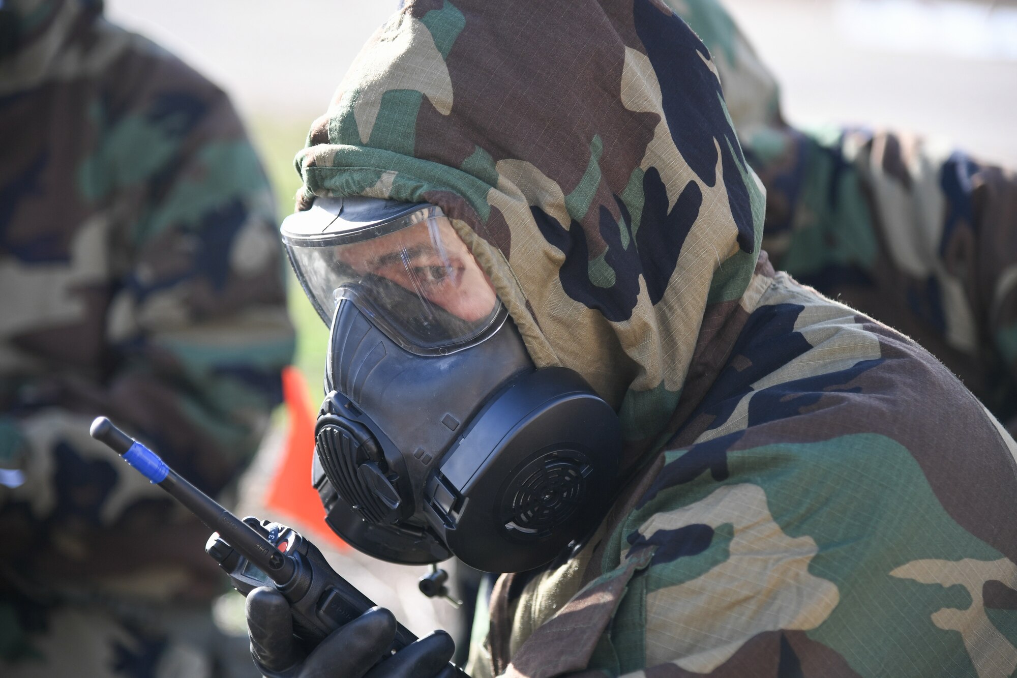 An Air Force reservist in the 419th Civil Engineer Squadron responds to a simulated rocket attack during a mock deployment