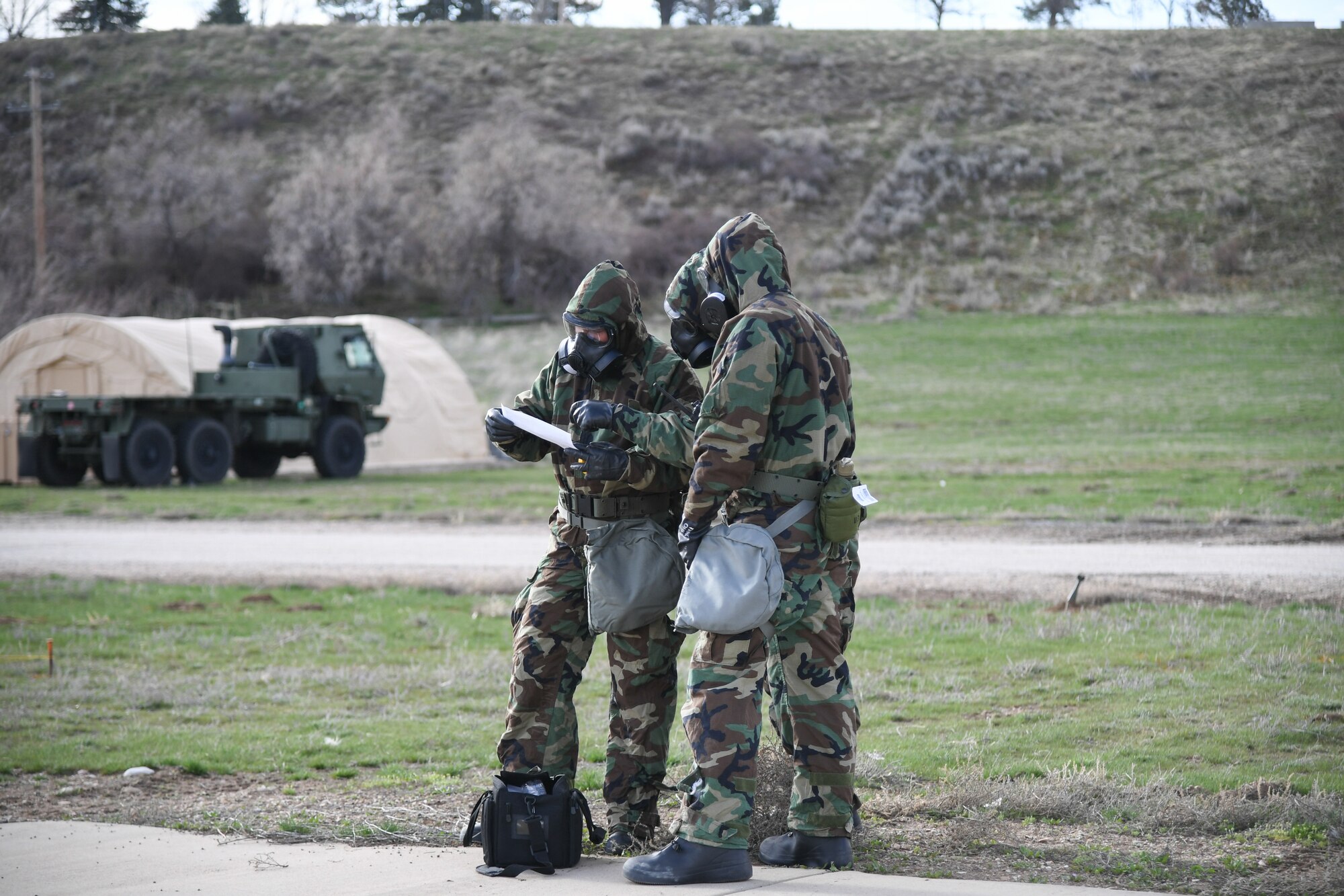 The post-reconnaissance team, part of the 419th Civil Engineer Squadron, looks for unexploded ordnance, casualties, and injured personnel during a mock deployment exercise