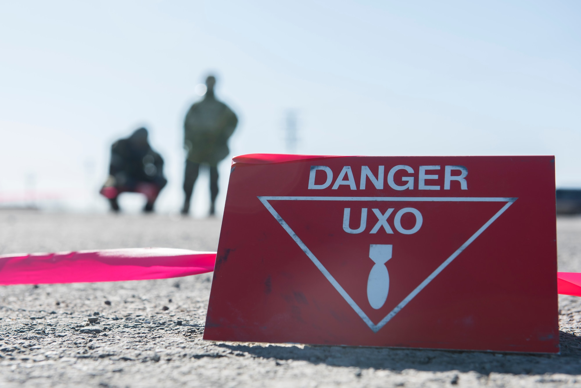 Danger signs surround an unexploded ordnance during exercise Polar Force at Joint Base Elmendorf-Richardson, Alaska, April 3, 2019. Polar Force is a two-week exercise designed to test JBER’s mission readiness, and develops the skills service members require to face adverse situations.