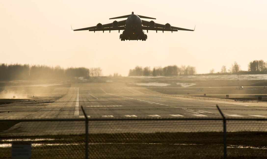 A C-17 Globemaster lll takes off during Polar Force 19-4 at Joint Base Elmendorf-Richardson, Alaska, April 1, 2019. Polar Force is a two-week exercise designed to test JBER’s mission readiness, and develops the skills service members require to face adverse situations.