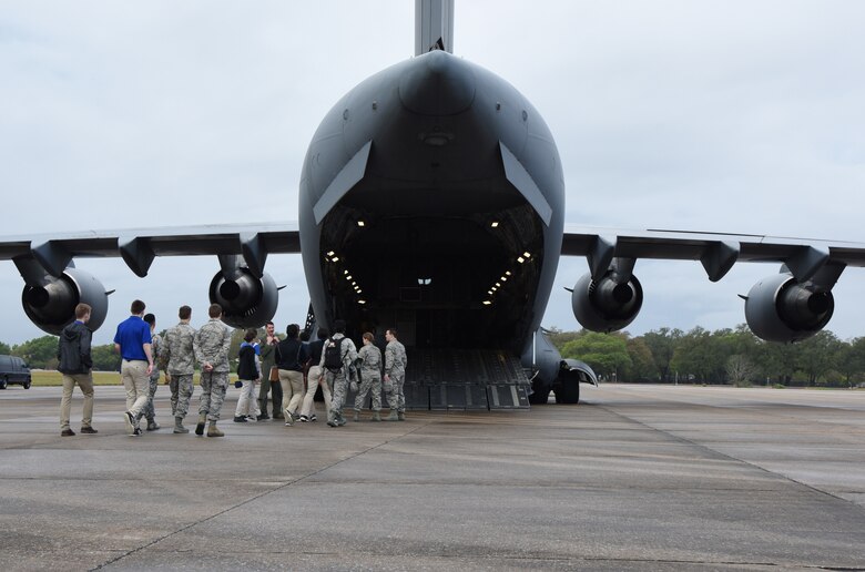Air Force ROTC cadets board a C-17 Globemaster III for a tour during the fifth annual Pathways to Blue on Keesler Air Force Base, Mississippi, April 5, 2019. Pathways to Blue is a diversity outreach event hosted by Second Air Force with the support of the 81st Training Wing and the 403rd Wing. More than 250 cadets from 12 different colleges and universities were provided hands-on demonstrations of various career fields. (U.S. Air Force photo by Kemberly Groue)