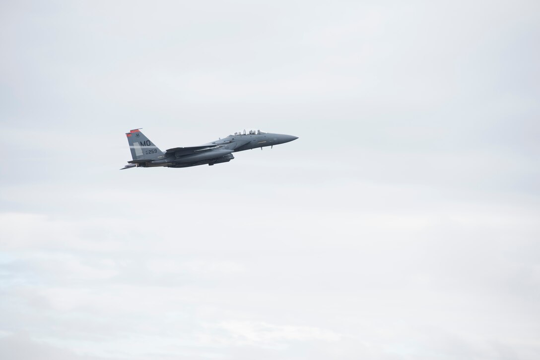 Image of an F-15E Strike Eagle takes off from Mountain Home Air Force Base, Idaho, April 3, 2019. The flight was in participation of the Gunfighter Flag exercise. (U.S. Air Force photo by Alaysia Berry)