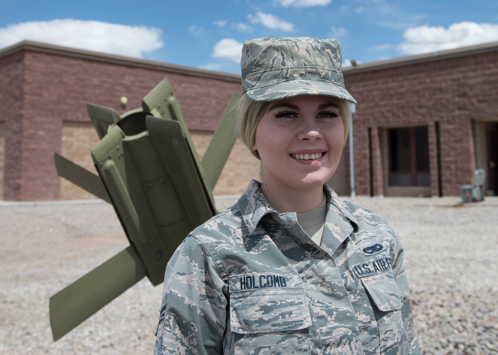 Airman 1st Class Alicia Holcomb, 49th Equipment Maintenance Squadron’s munitions systems specialist, poses for a photo on Holloman Air Force Base, N.M. Airman 1st Class Alicia Holcomb, 49th Equipment Maintenance Squadron’s munitions systems specialist, poses for a photo on Holloman Air Force Base, N.M. Holcomb’s journey with Holloman’s Alcohol and Drug Abuse and Prevention Treatment program has not been perfect, but she continues to persevere in times of weakness so she can complete her program this summer. (U.S. Air Force photo by Airman 1st Class Kindra Stewart)