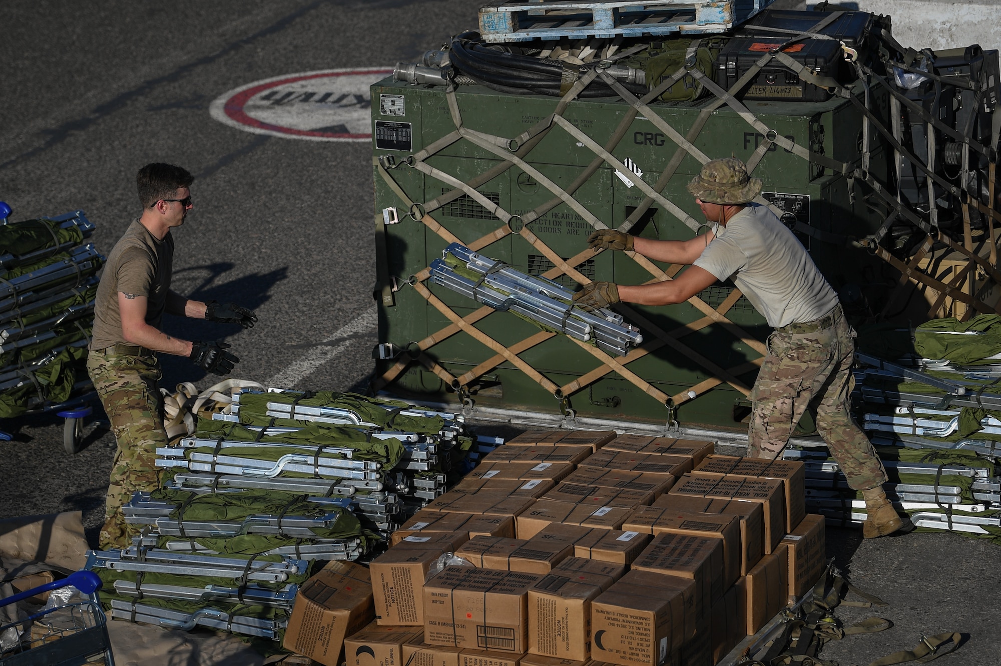 U.S. Airmen assigned to the 435th Contingency Response Group, Ramstein Air Base, Germany, supporting Combined Joint Task Force-Horn of Africa (CJTF-HOA), set up a forward operating location at Beira Airport, Mozambique, April 2, 2019, for the U.S. Department of Defense’s (DoD) relief effort in the Republic of Mozambique and surrounding areas following Cyclone Idai. Teams from CJTF-HOA, which is leading DoD support to relief efforts in Mozambique, began immediate preparation to respond following a call for assistance from the U.S. Agency for International Development’s Disaster Assistance Response Team. (U.S. Air Force photo by Staff Sgt. Corban Lundborg)