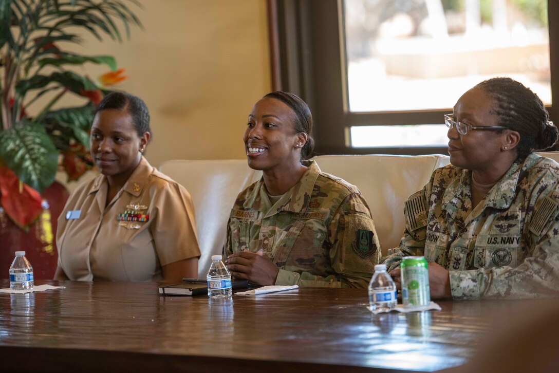 Chief Master Sgt. Jamesha Barnes, assigned to Headquarters, Readiness and Integration Organization Det. 2, speaks about her experiences as a female Airman during the Joint Base Pearl Harbor-Hickam Women's History Month observance panel. (U.S. Navy photo by Mass Communication Specialist 2nd Class Charles Oki/Released)