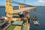 SANTA RITA, Guam (April 4, 2019) Sailors assigned to Navy Cargo Handling Battalion (NCHB) 1, Detachment Guam monitor a Mark VI patrol boat from Coastal Riverine Squadron 2 Det. Guam, during a first-time proof of concept lift on board the Military Sealift Command maritime prepositioning force ship USNS 2nd Lt. John P. Bobo (T-AK 3008) in Apra Harbor. NCHB-1, Detachment Guam, assigned to Commander, Task Force 75, is the Navy’s only active duty cargo handling battalion. They are a rapidly deployable unit of the Navy Expeditionary Combat Command, capable of loading and discharging ships and aircraft in all-climatic and threat conditions.