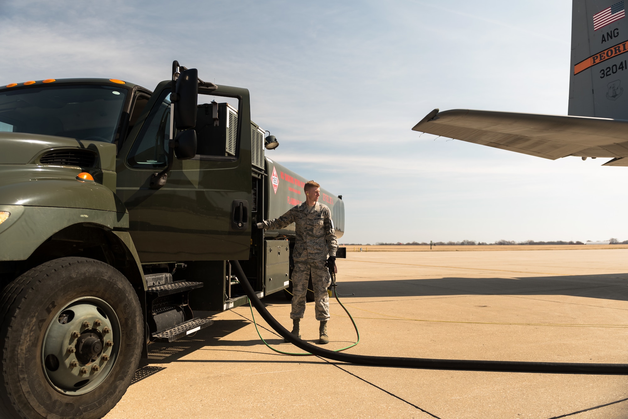 Airman operating refueling truck.